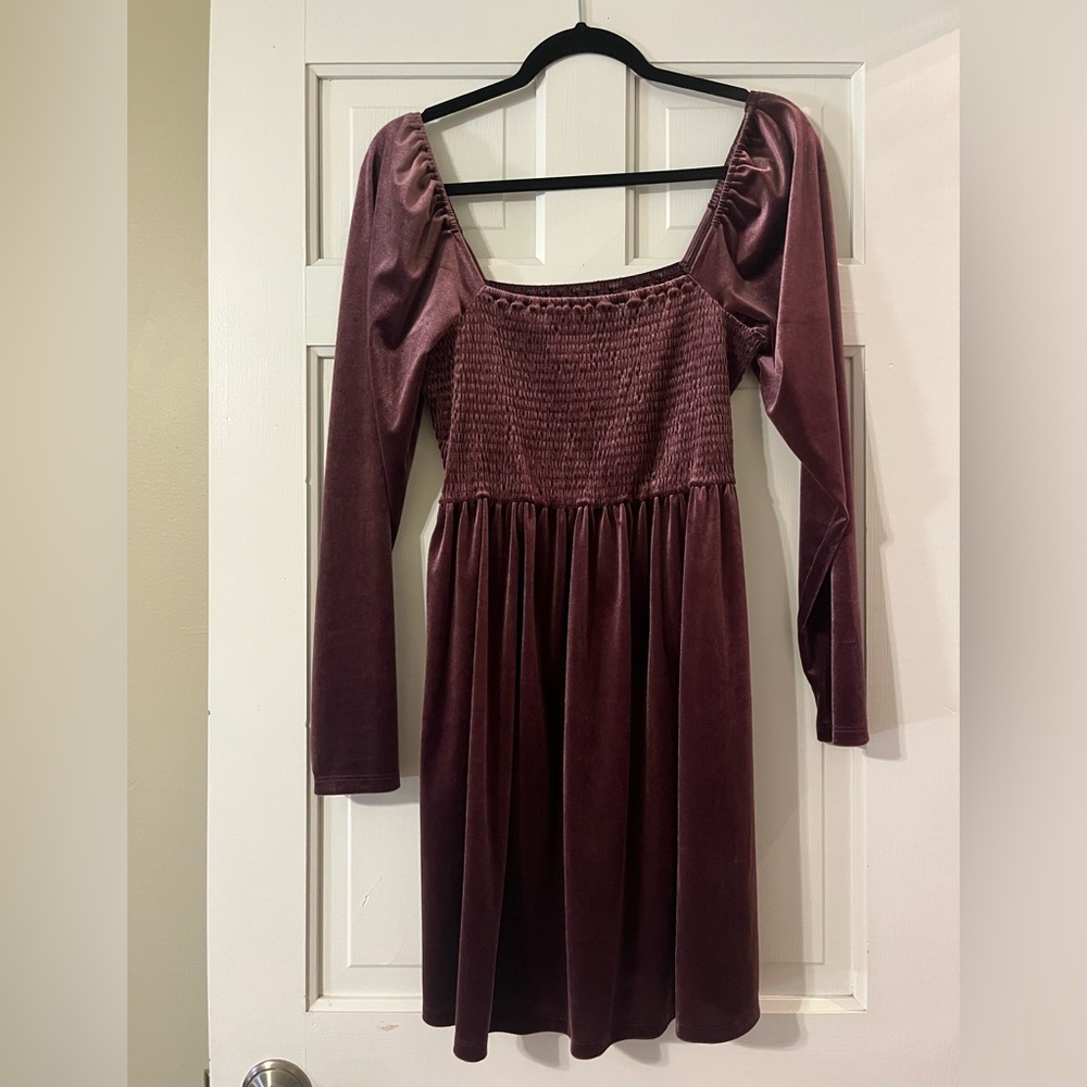 Purple velvet long sleeved ruched mini dress. Great for fall/winter events